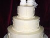 (1143) Winter Wedding Cake with Snow-People Topper