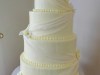 (1126) White Fondant Swag Wedding Cake